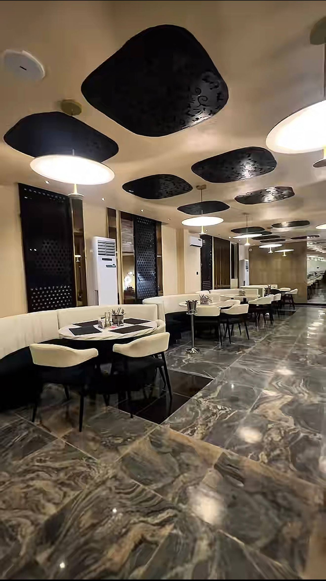 Avra Restaurant dining room at GAIA HOTELS & SUITES